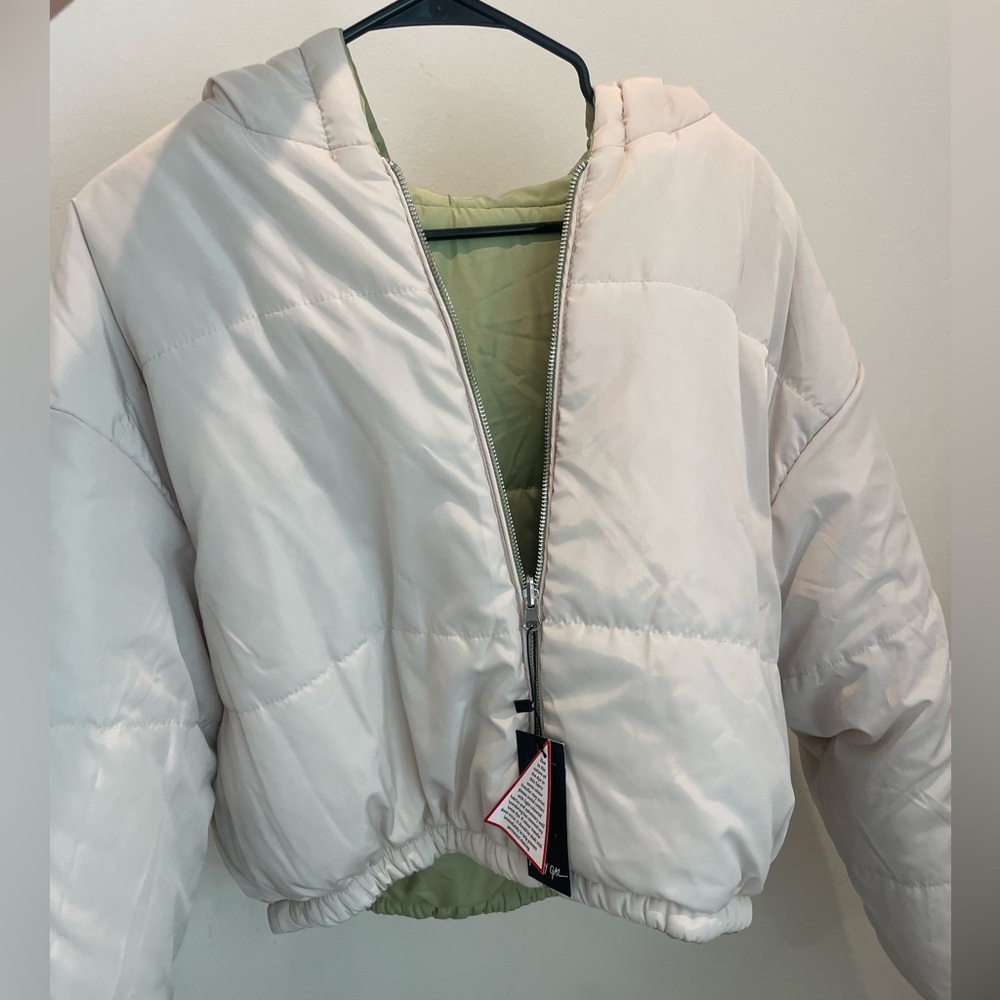 Reversible hooded  jacket, colors are green and cream never worn with tags,
